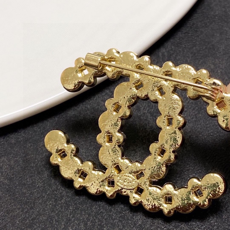 Ch**el brooches